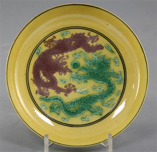 A Chinese yellow glazed dragon saucer dish, Guangxu mark and of the period (1875-1908), diameter 13cm